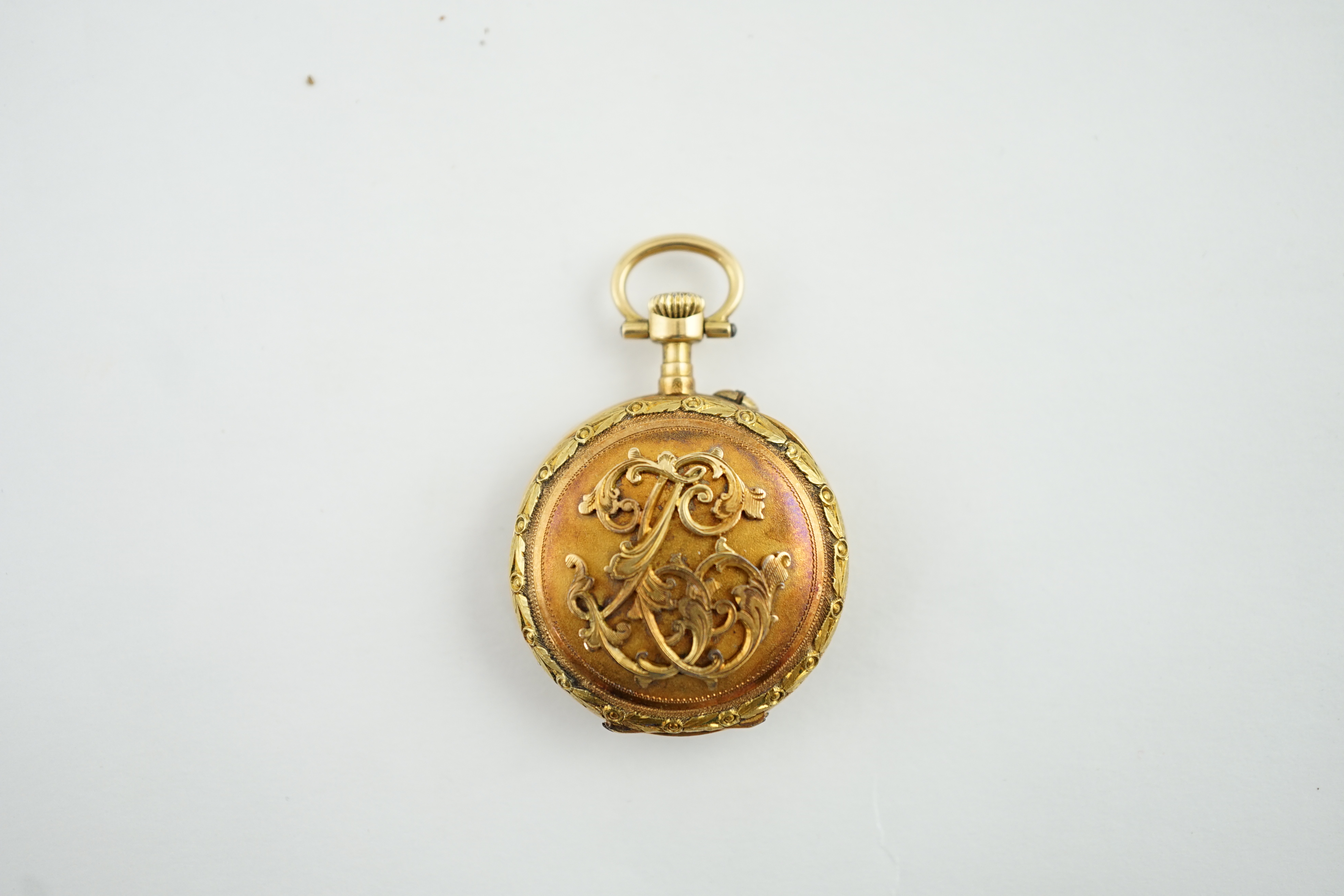 An early 20th century Swiss two colour gold fob watch